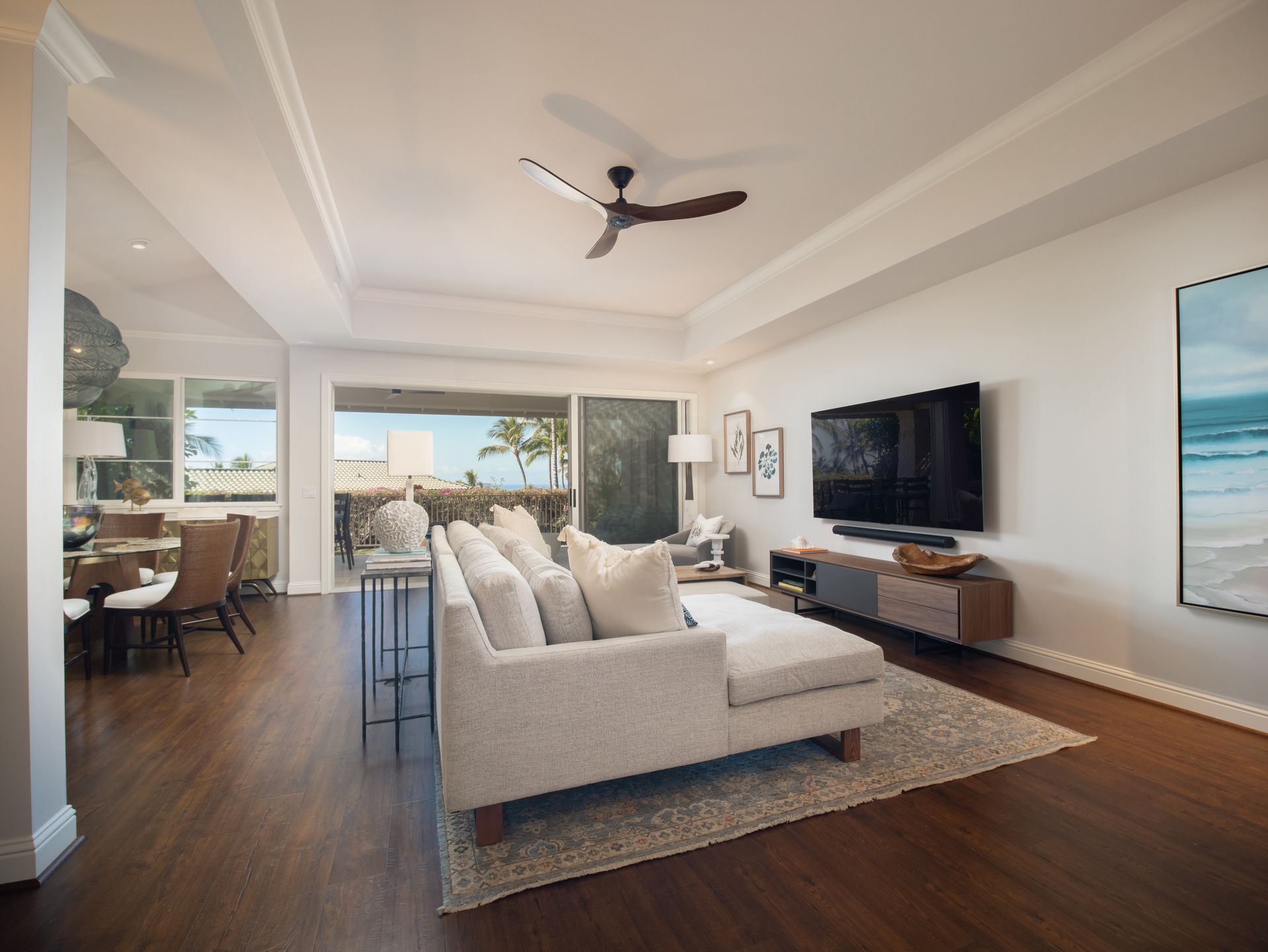 A living room with a couch and a flat screen tv