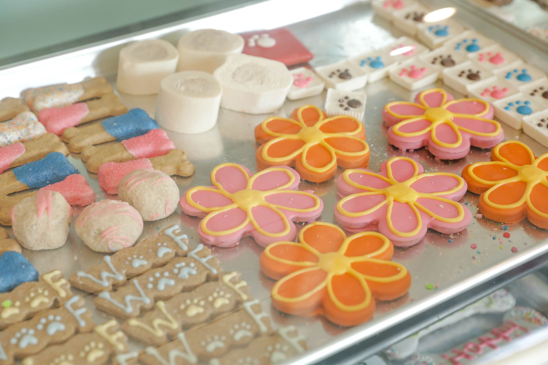 There are many different types of cookies on the tray.