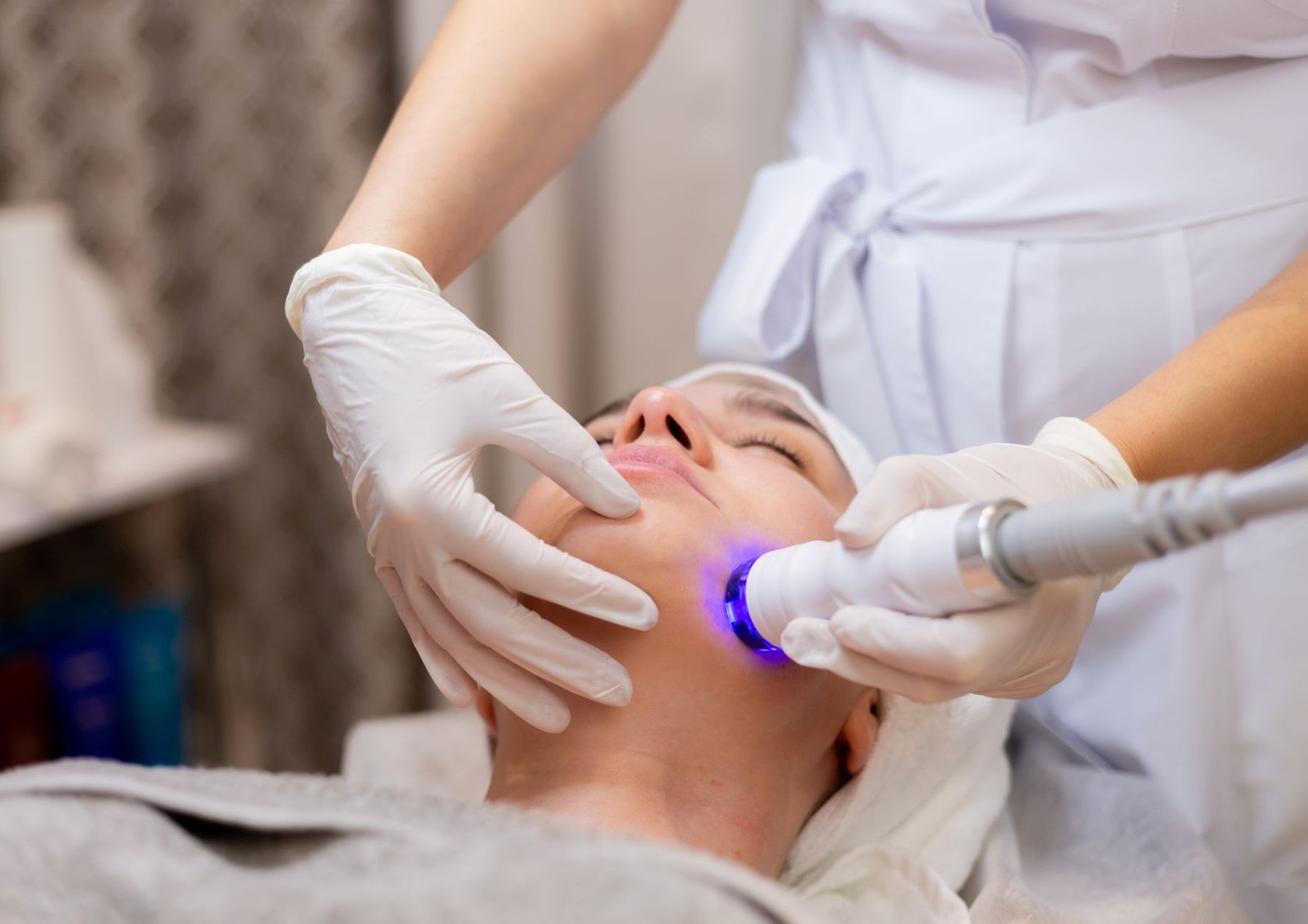 Photofacial being performed on a woman