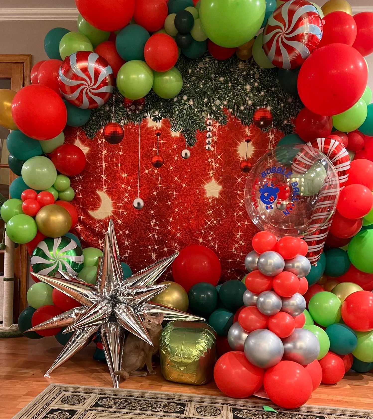 A room filled with lots of balloons and decorations for christmas