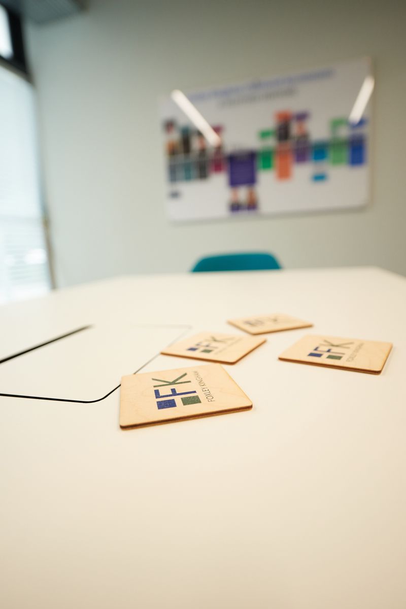A table with a bunch of cards on it that say ' a ' on them