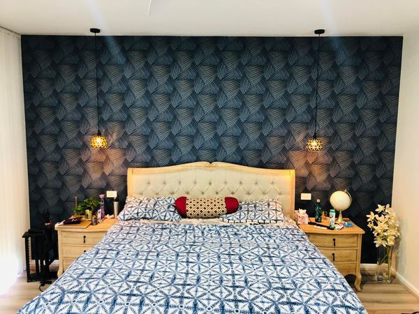 bedroom with green wallpaper