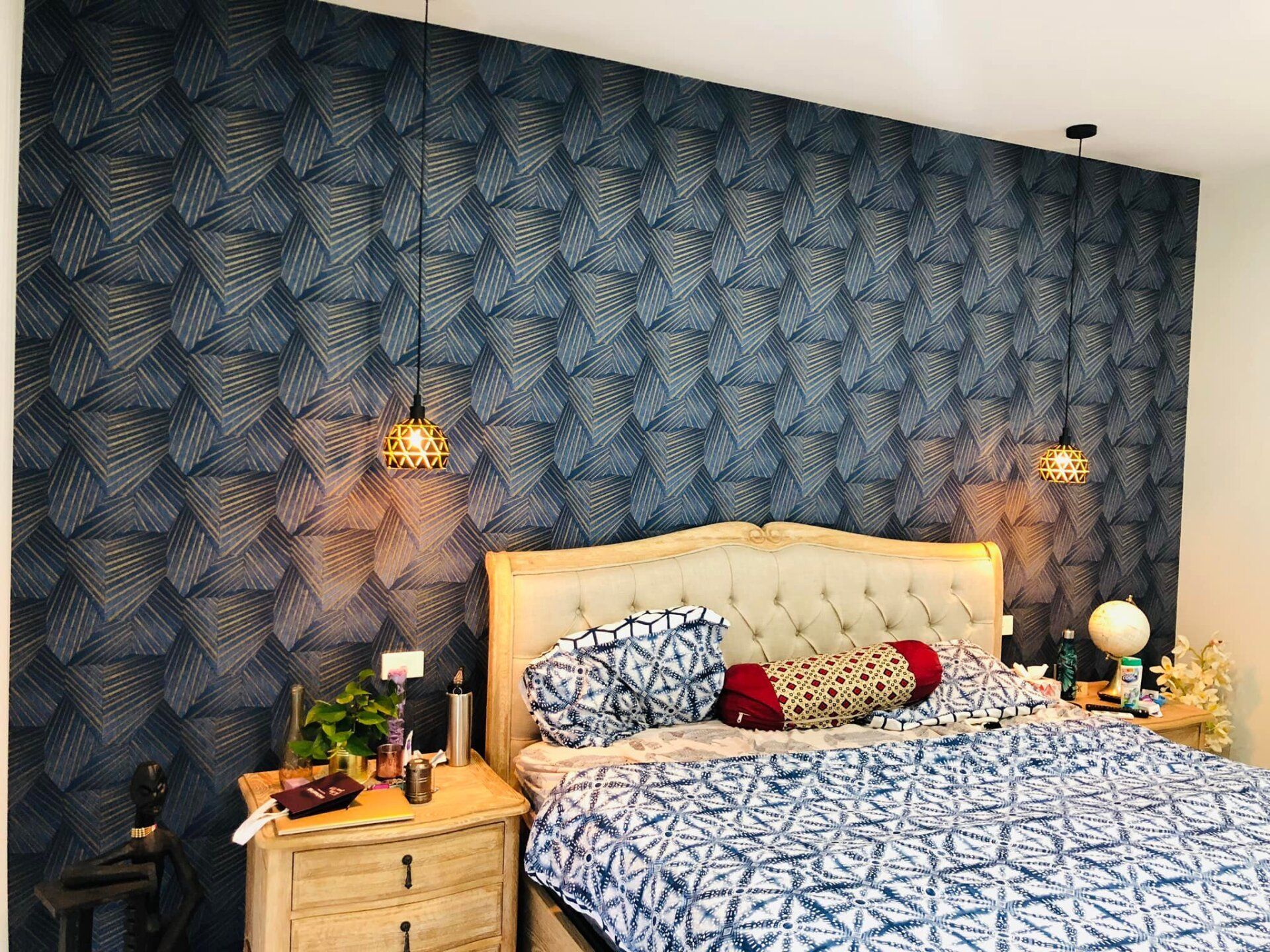 Bedroom with blue wallpaper