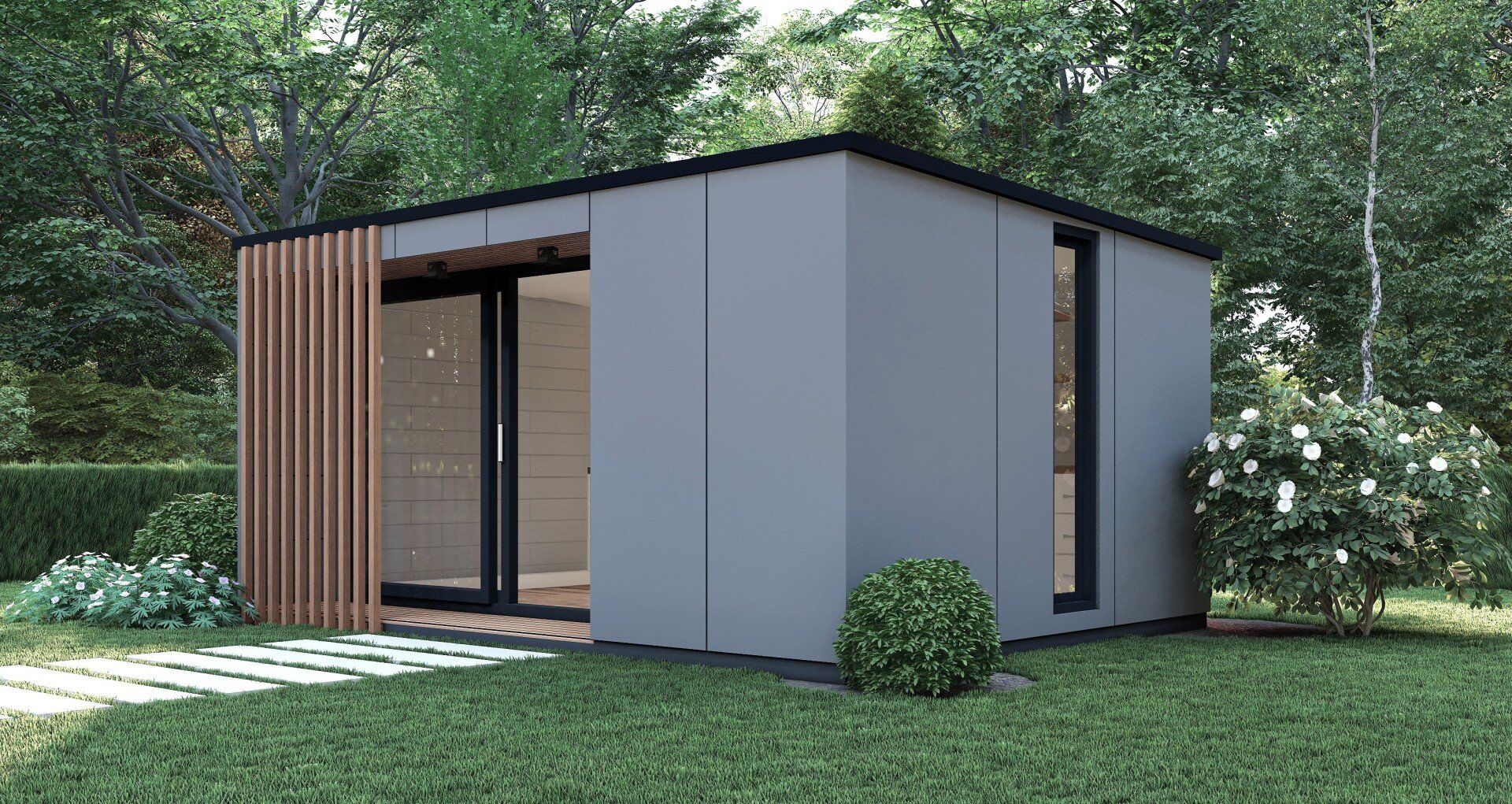 Modern gray outdoor shed with wooden accent, glass door, and greenery in a yard.