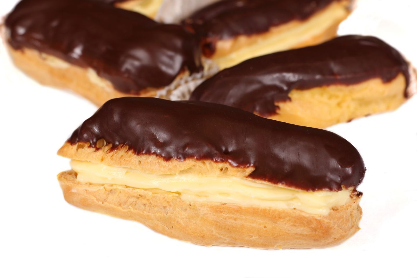Chocolate-covered éclairs with creamy filling.