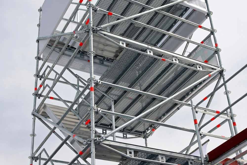 A Close Up Of A Scaffolding Tower With A Ladder On Top Of It — Triple S Scaffolding In Taree, NSW