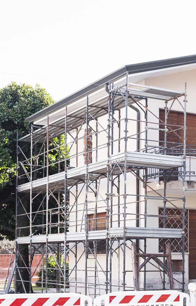 A House Is Being Built With Scaffolding Around It — Triple S Scaffolding In Taree, NSW