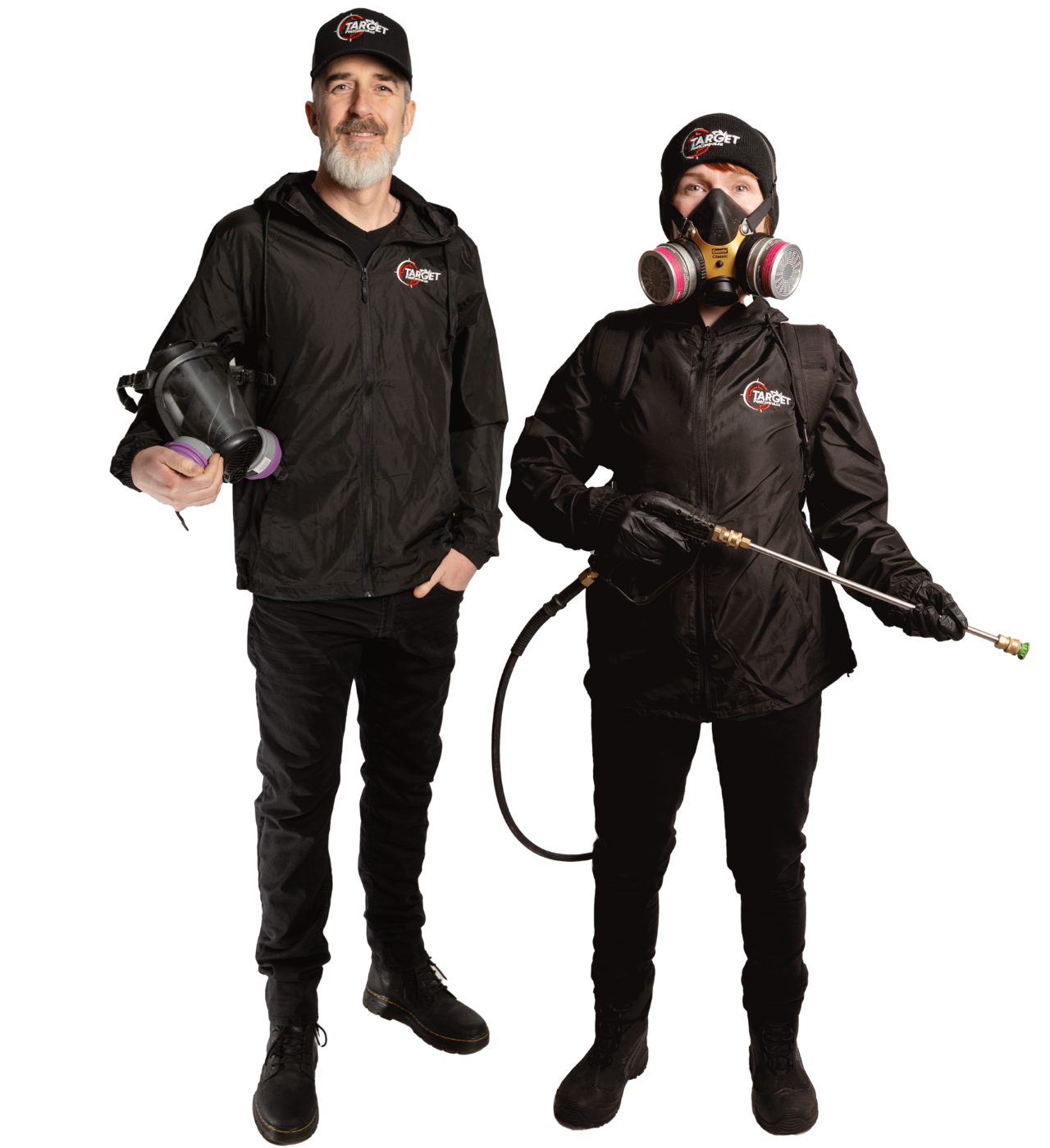 a man and a woman wearing gas masks are standing next to each other .