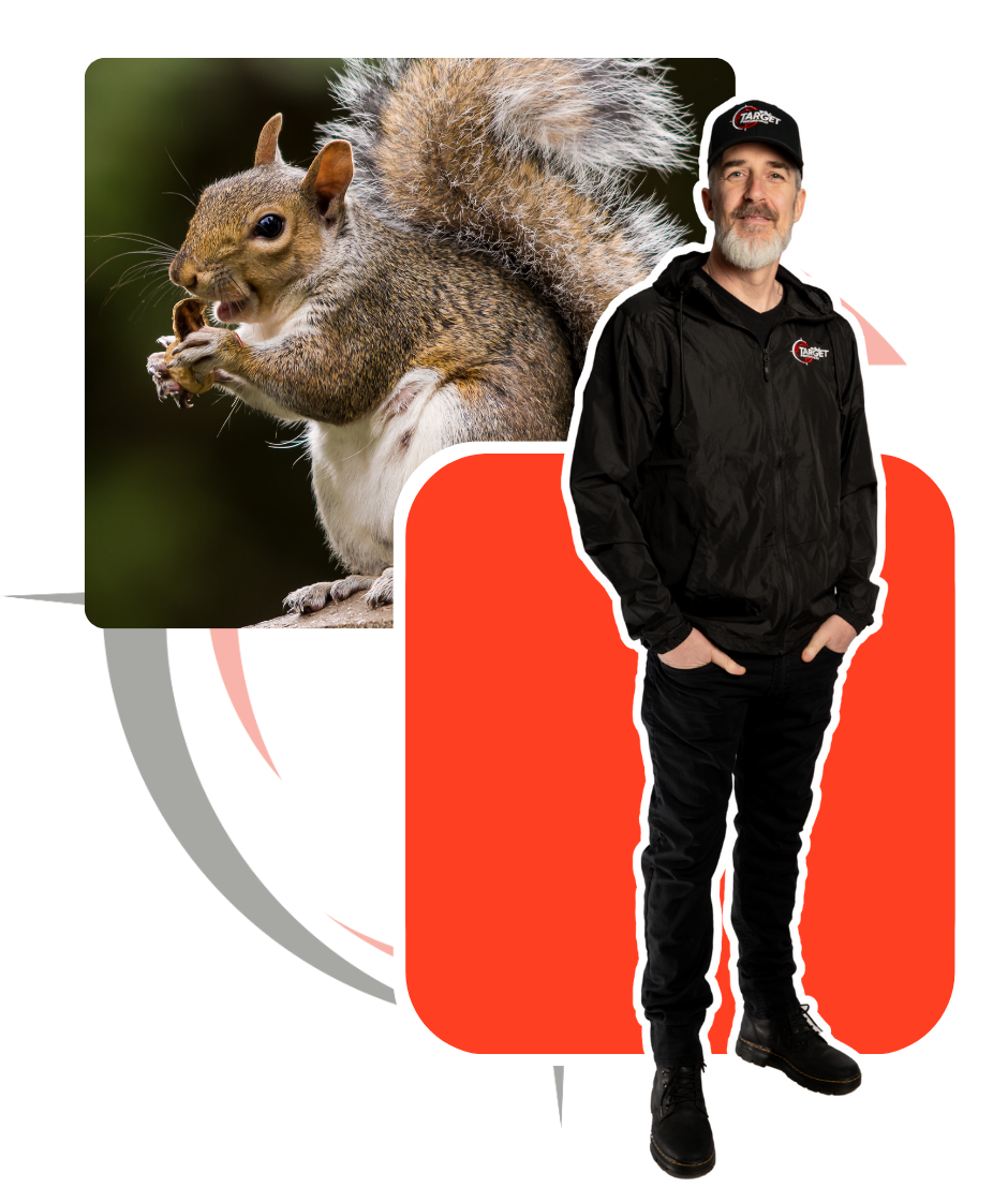 A man standing next to a picture of a squirrel
