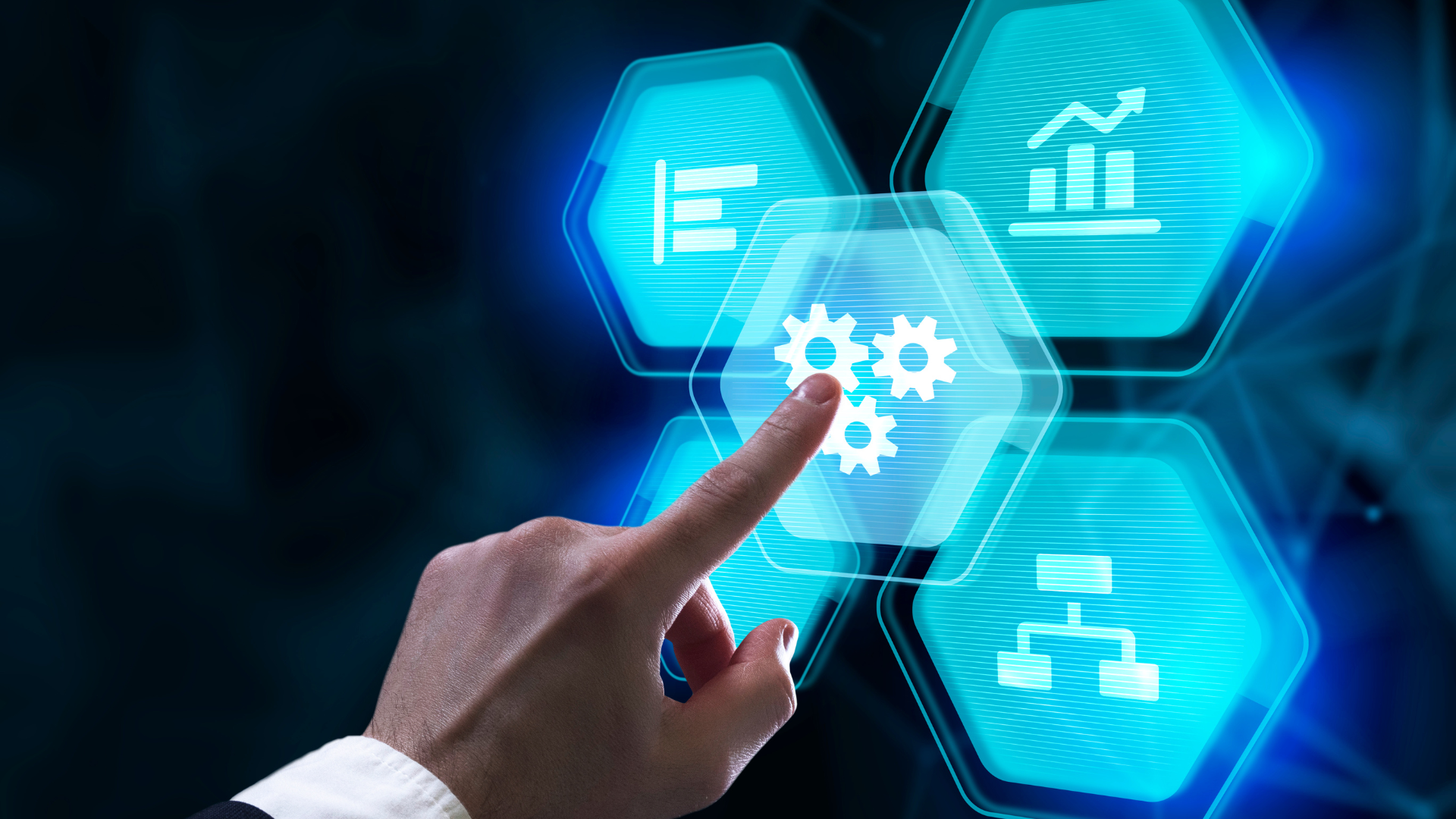 Hand touching a gear icon, surrounded by other business-related icons on a blue, glowing background.