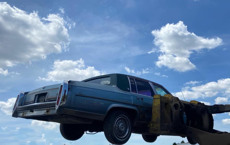 Car Being Lift — Leland, IL — Gibson Towing