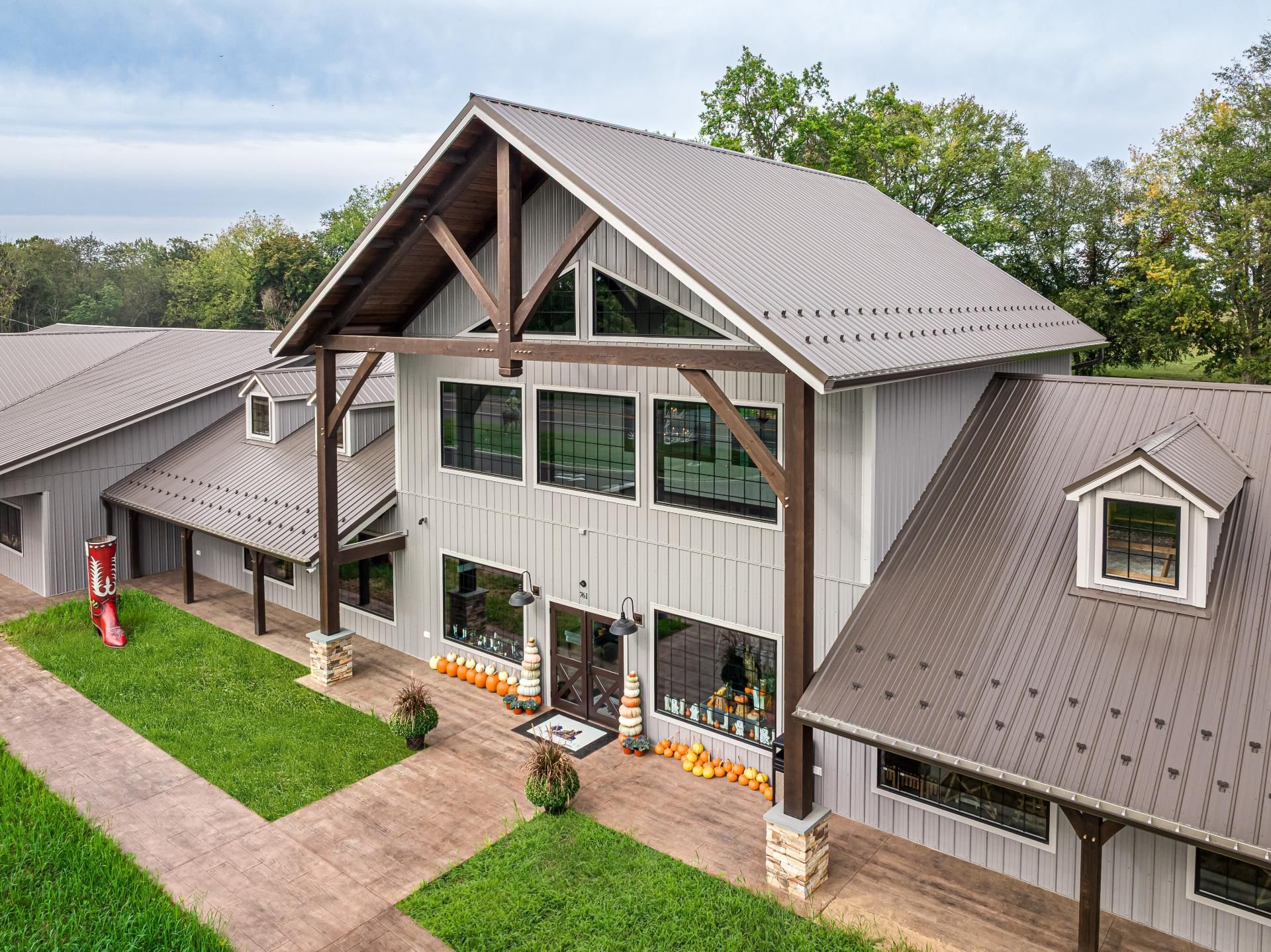 Exterior shot of Bullhide Brewery showing the timber frame construction and overhang roof gable. 
