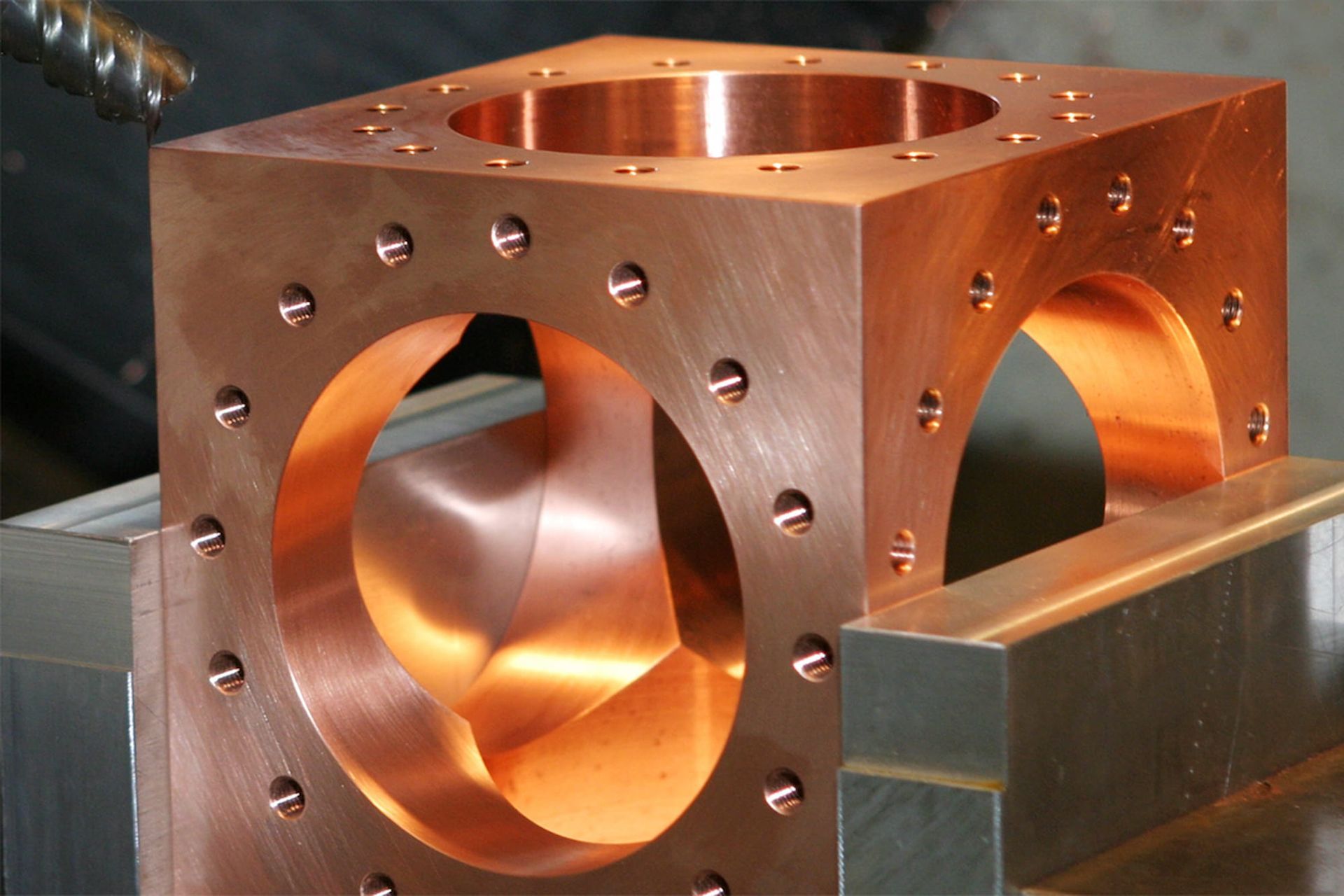 Custom square copper chamber being machined