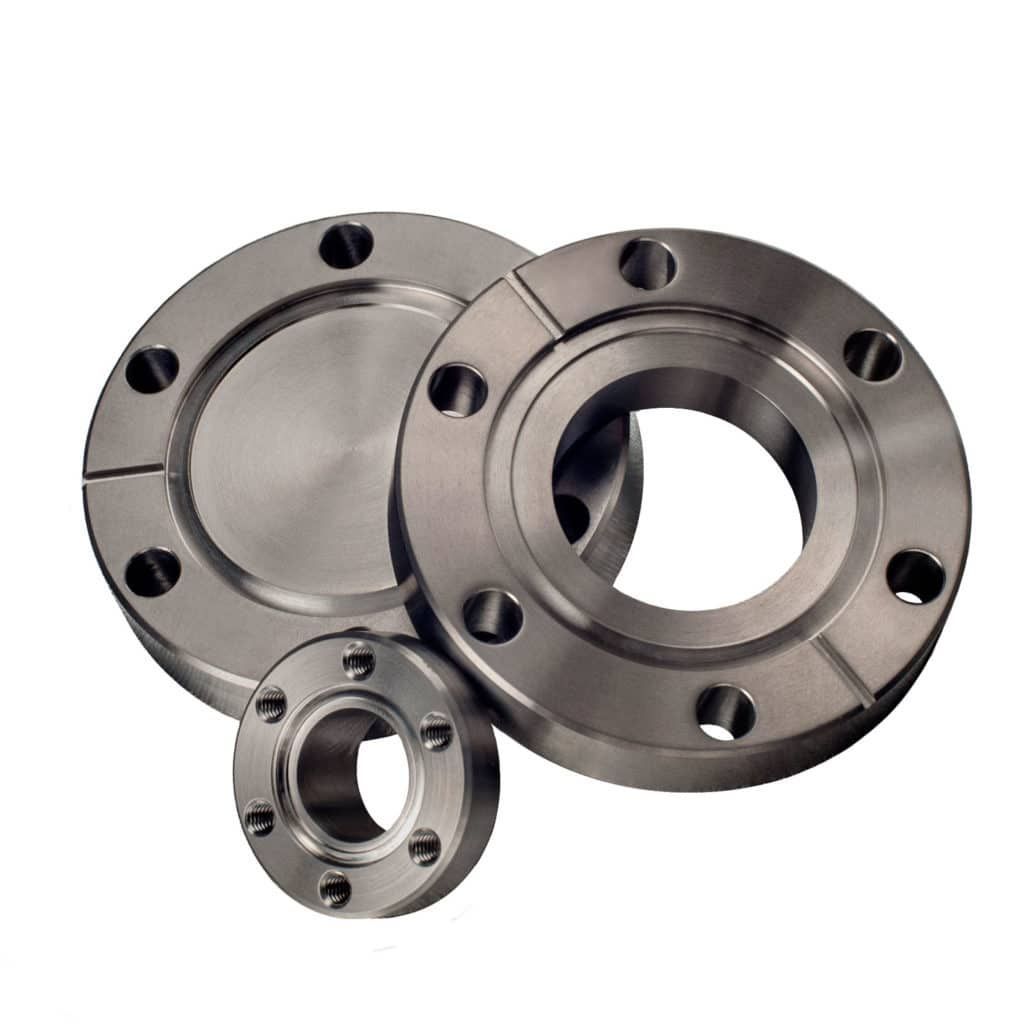 Three stainless steel flanges with holes in them on a white background