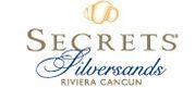 A logo for secrets silversands riviera cancun.