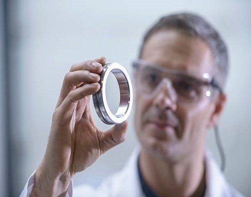 Inspecting The Rounded Metal — Moorabbin, VIC — Beta Metal Spinning Co