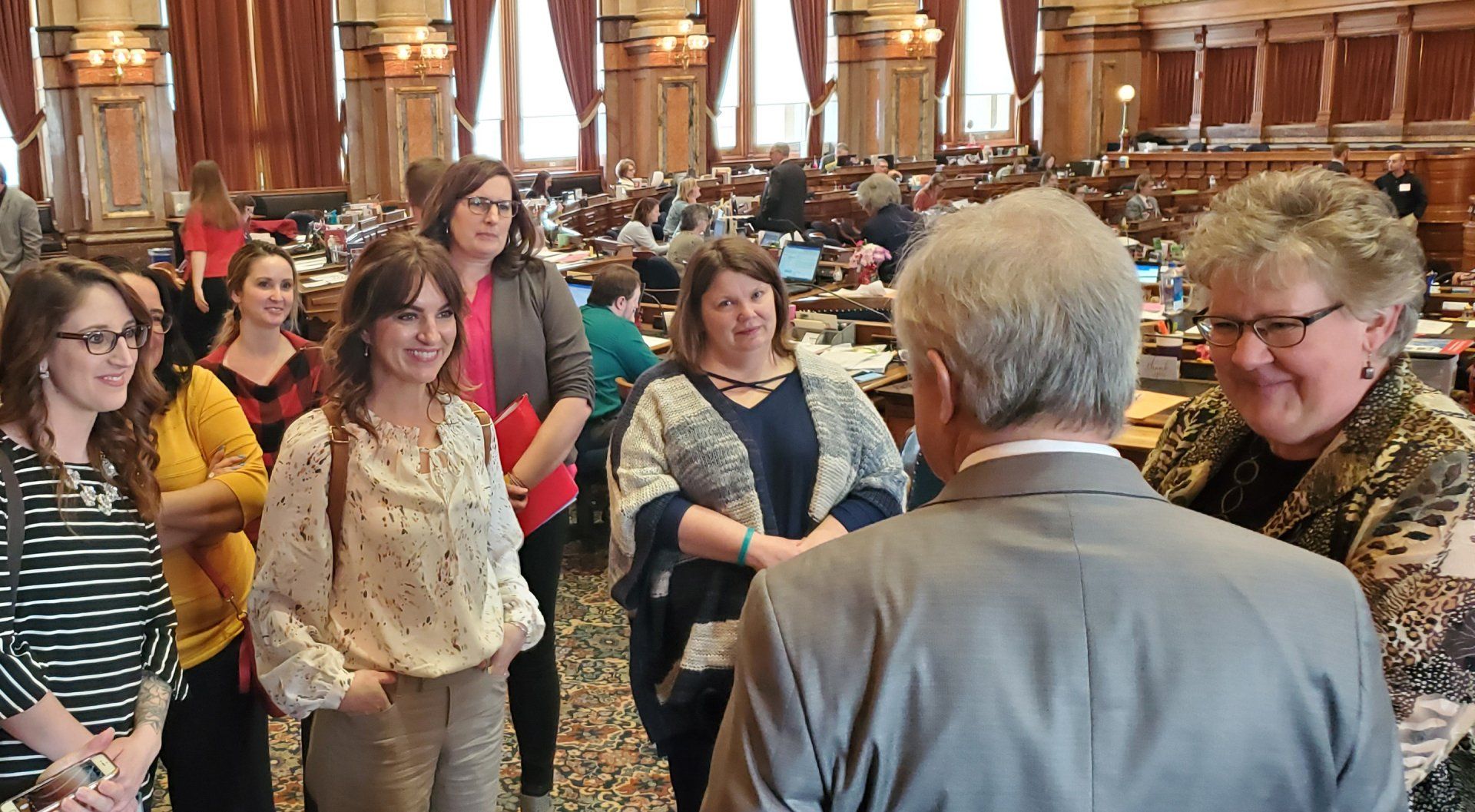 People Talking in a Group at the Iowa Capitol
