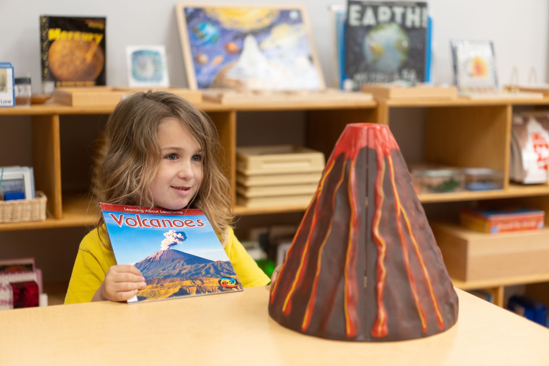 Montessori child working with geology materials