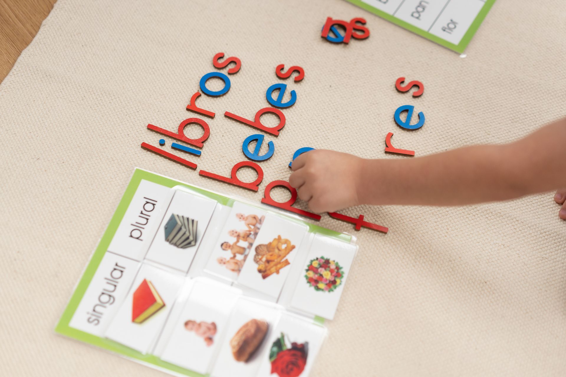 Montessori child working with Spanish Materials