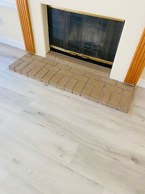 fireplace transition vinyl plank floor northcounty CA