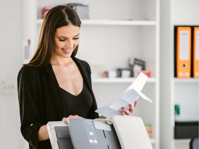 Woman printing on Printsmart copier