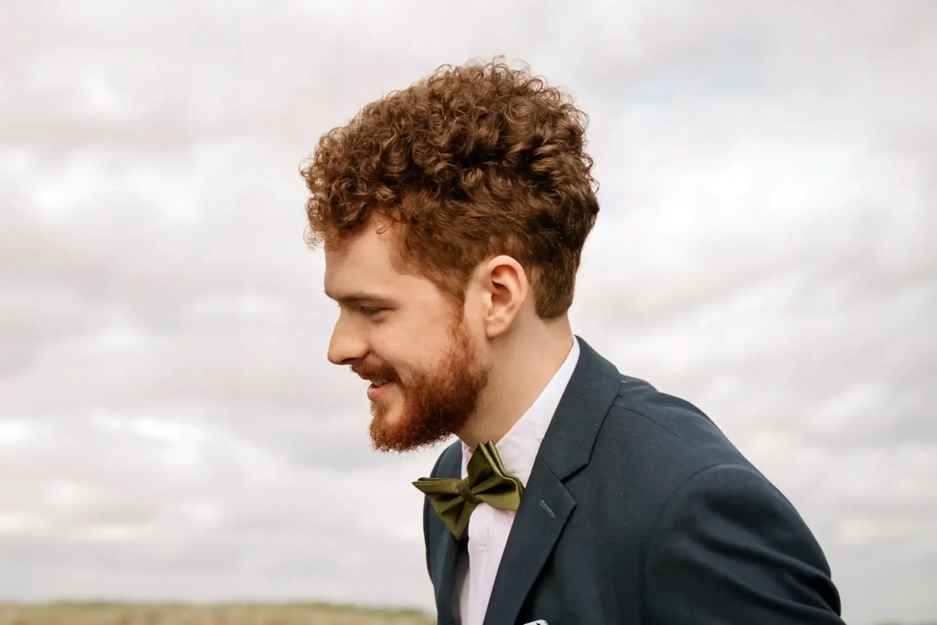 A drawing of a man wearing headphones on a wooden surface