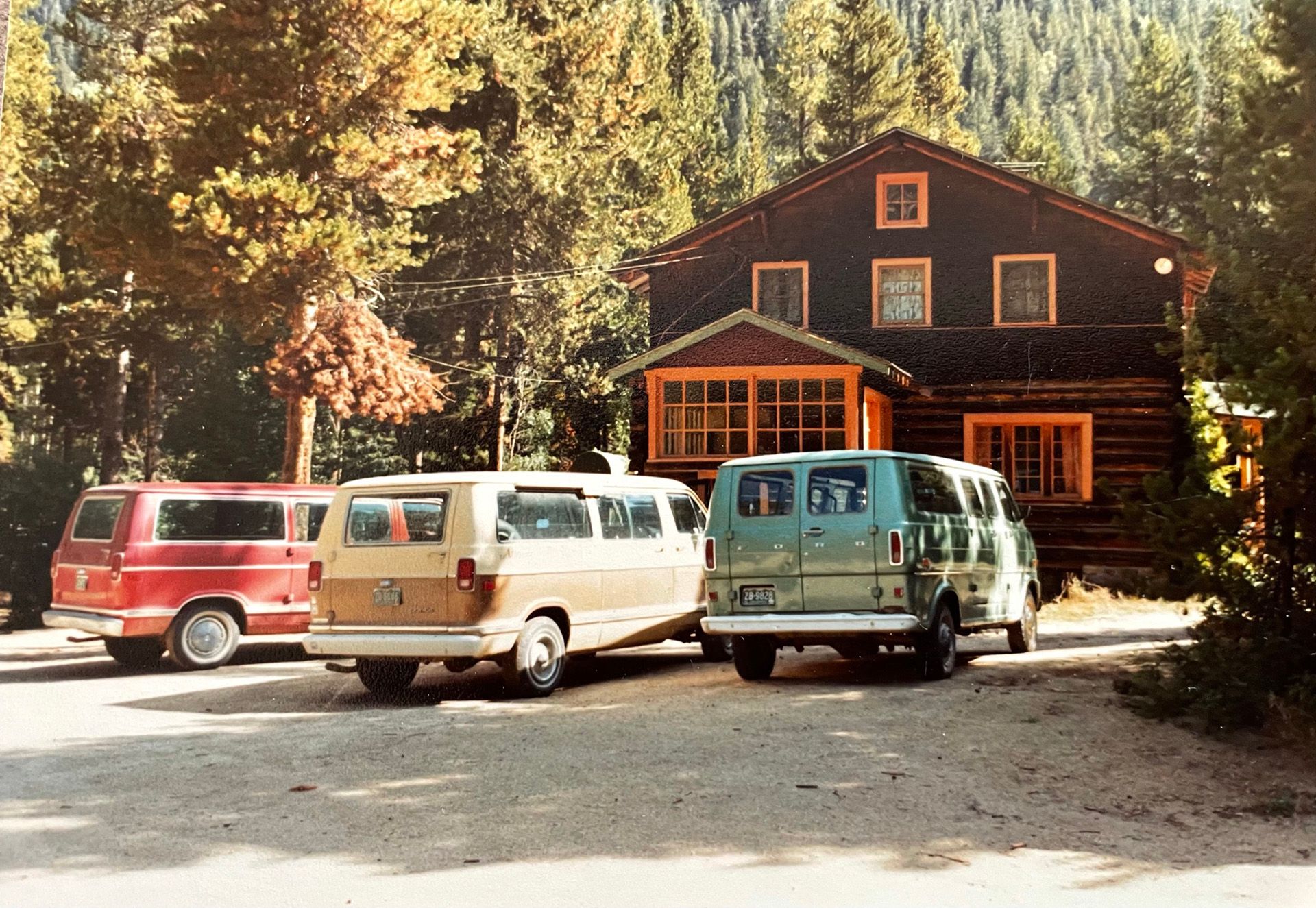 vans-parked-in-front-of-lodge