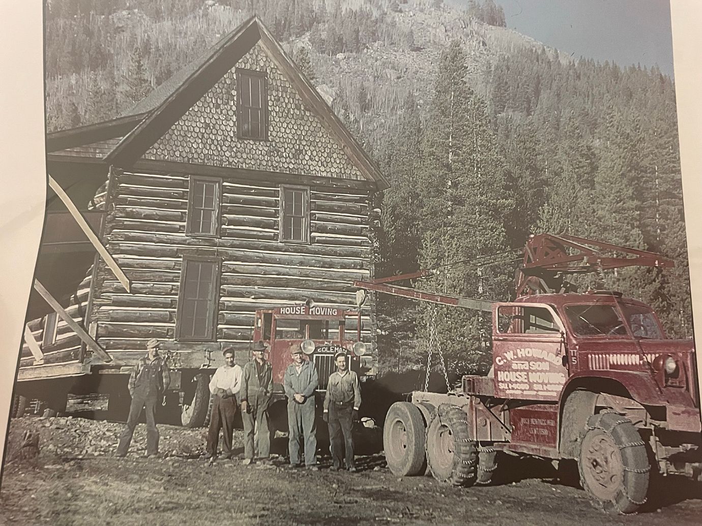 men-moving-cabin