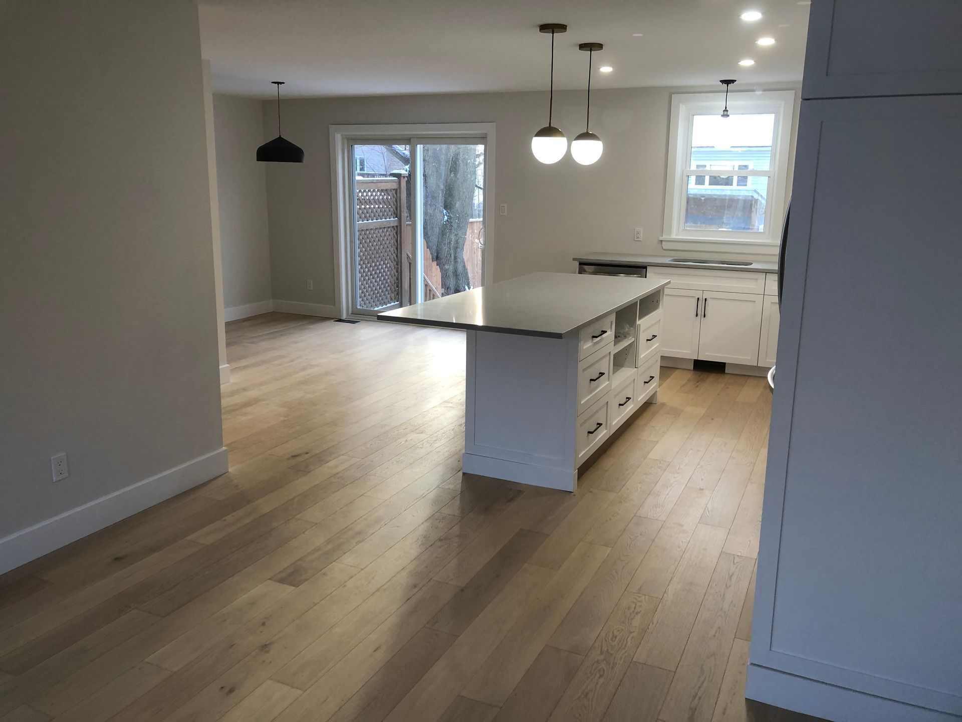 A kitchen with a large island in the middle of the room.
