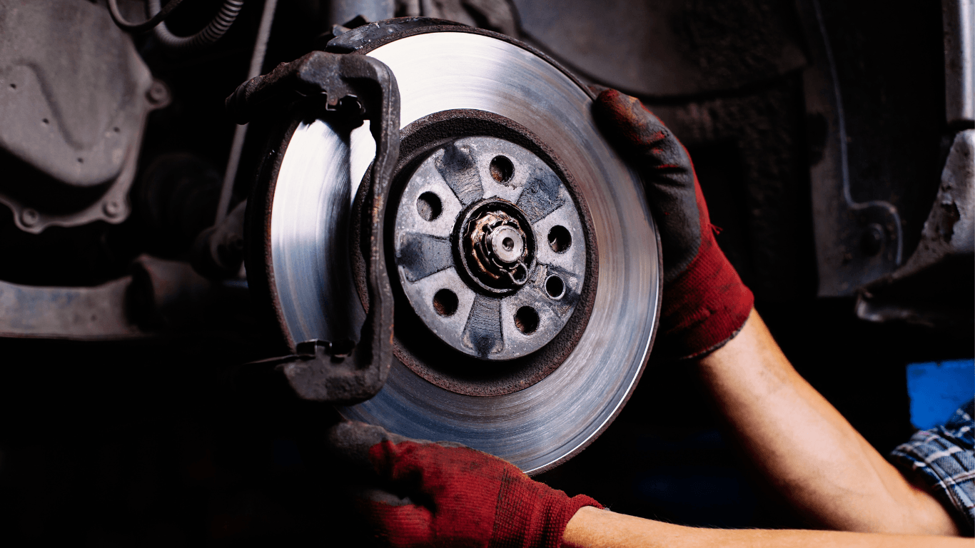 a mechanic changing brake parts