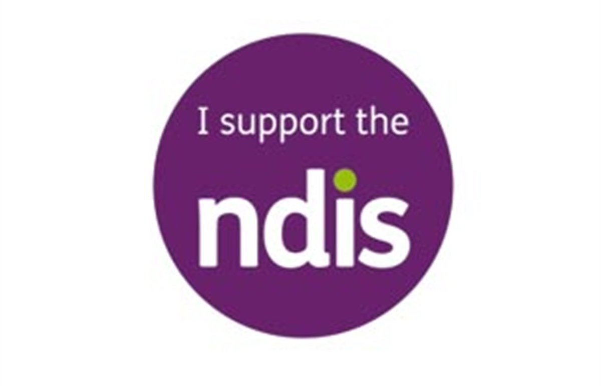 A purple circle that says i support the nds