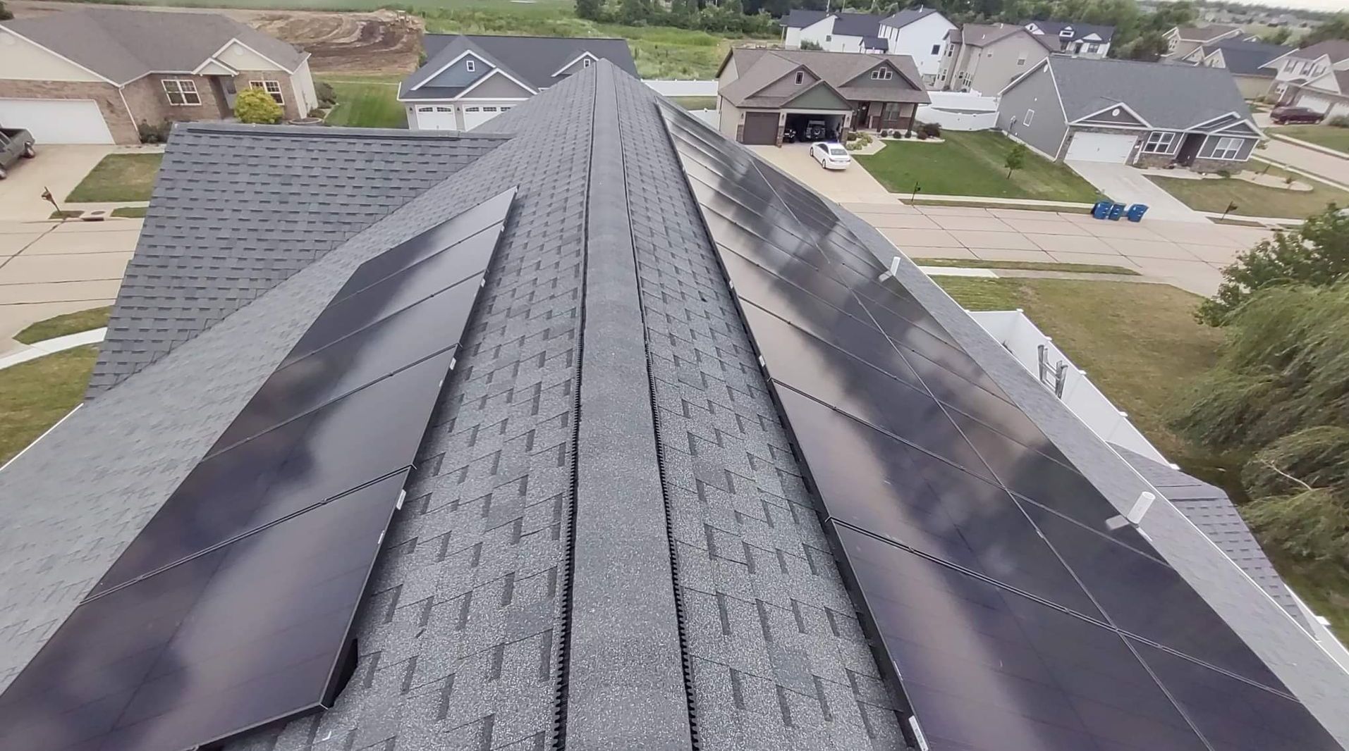 A roof with a lot of solar panels on it