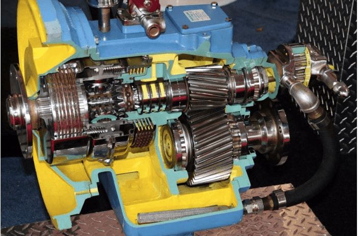A Blue and Yellow Gearbox With a Hose Attached to It — ElectroMech Machine in Woolner, NT