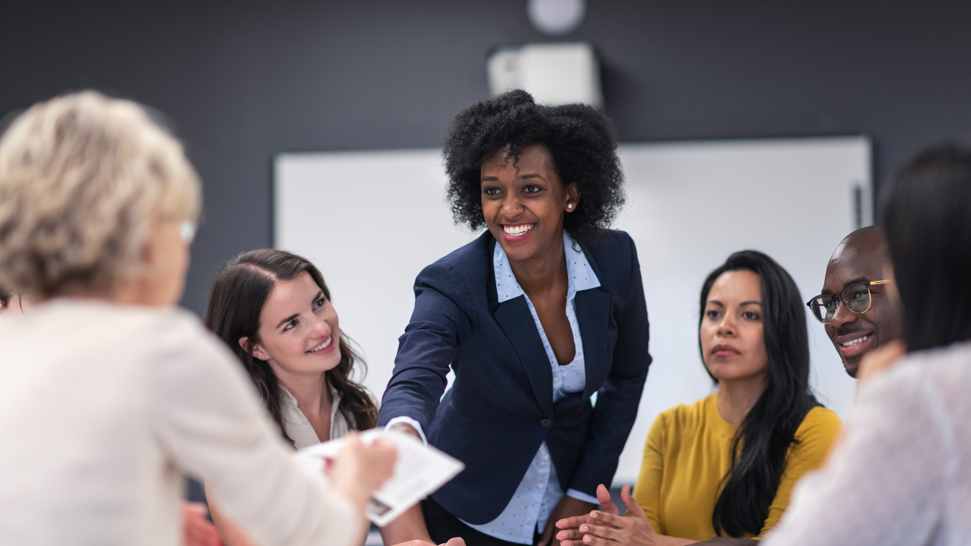 Corporate executives and a fractional CFO collaborating on a corporate financial risk management framework.
