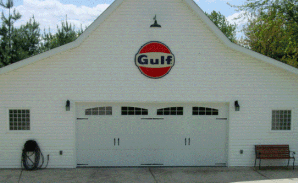 A White Garage With A Gulf Logo On It — Somerset, KY — Somerset Burnside Garage Door & Glass Co Inc