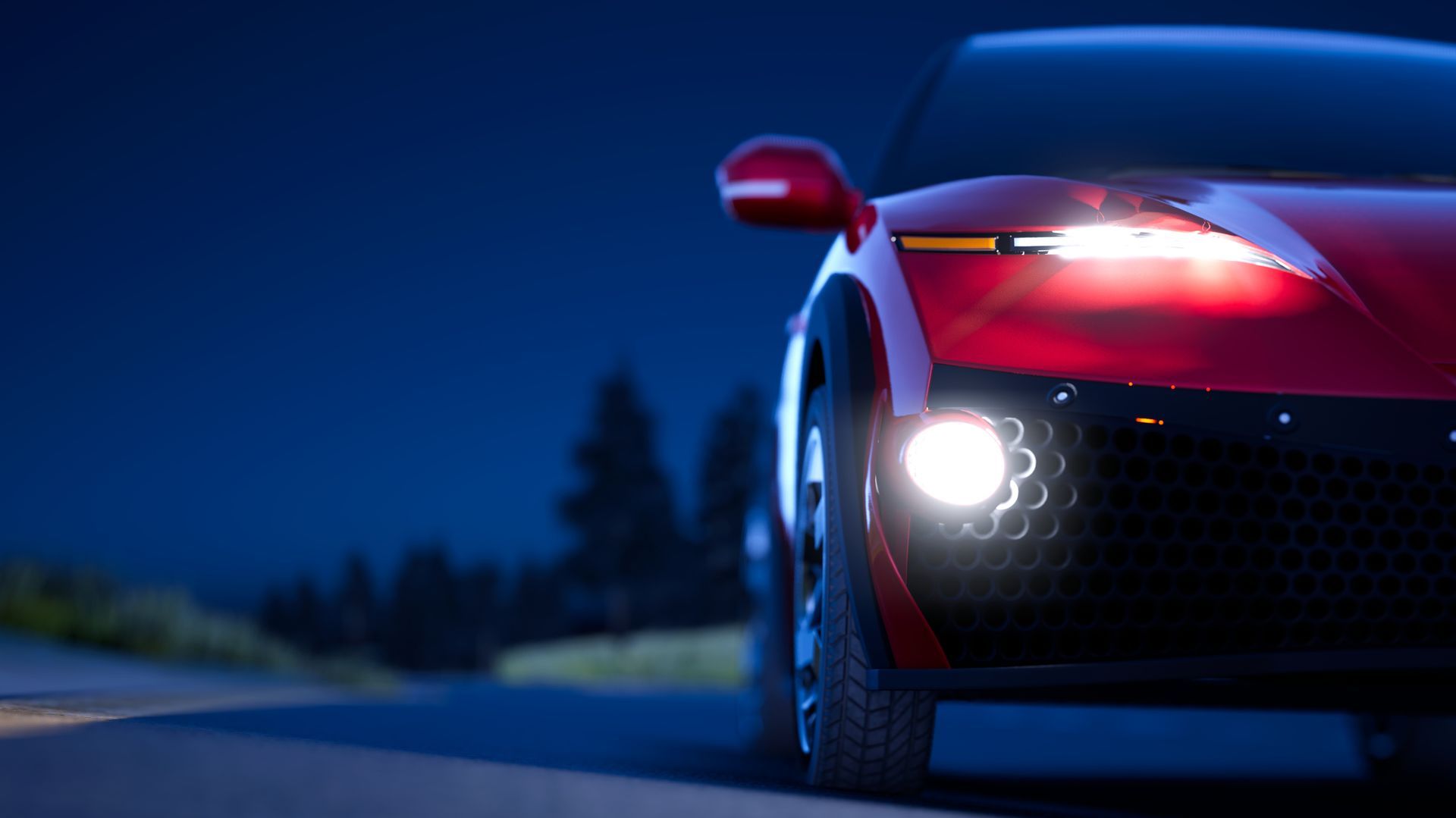 Red sports car driving on road at night, headlights on.