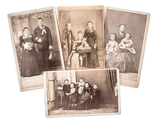 A group of old black and white photos of a family.