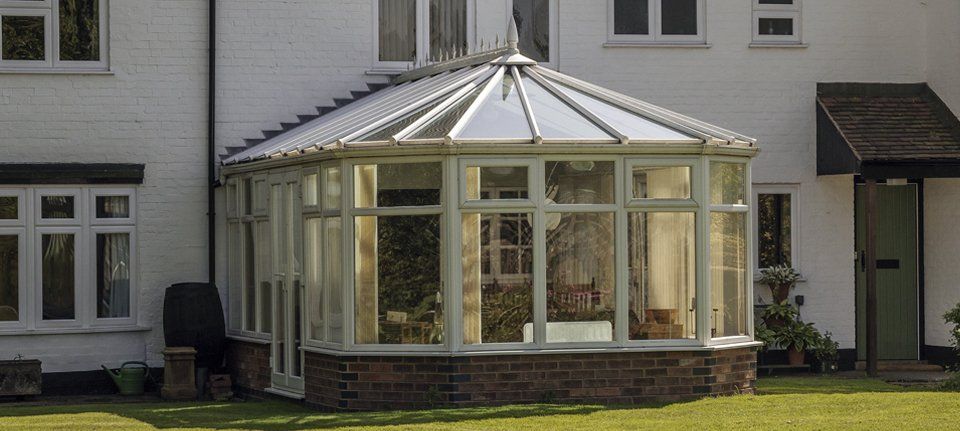 A conservatory on the back of a house