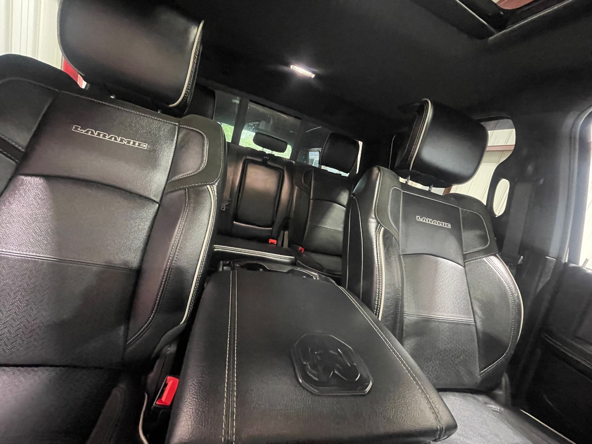 The back seat of a dodge ram 1500 is shown.