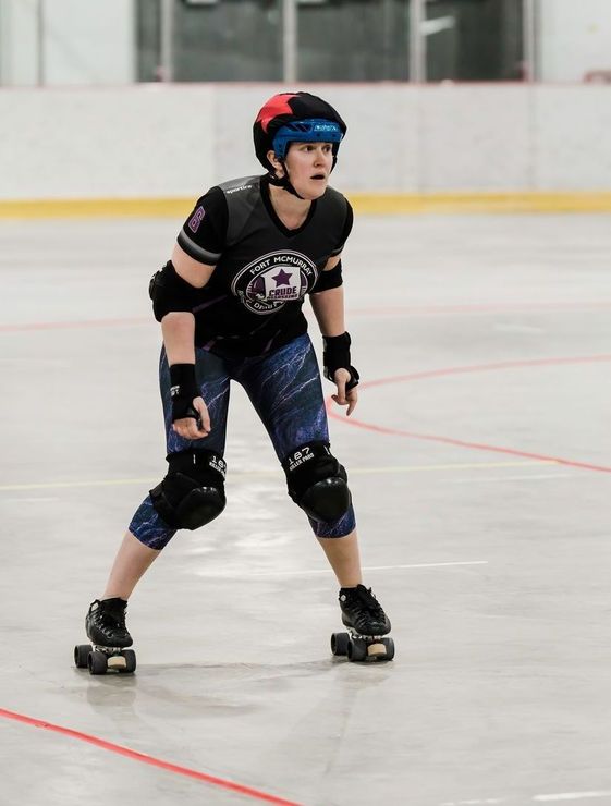 Roller derby jammer lined up to start the game