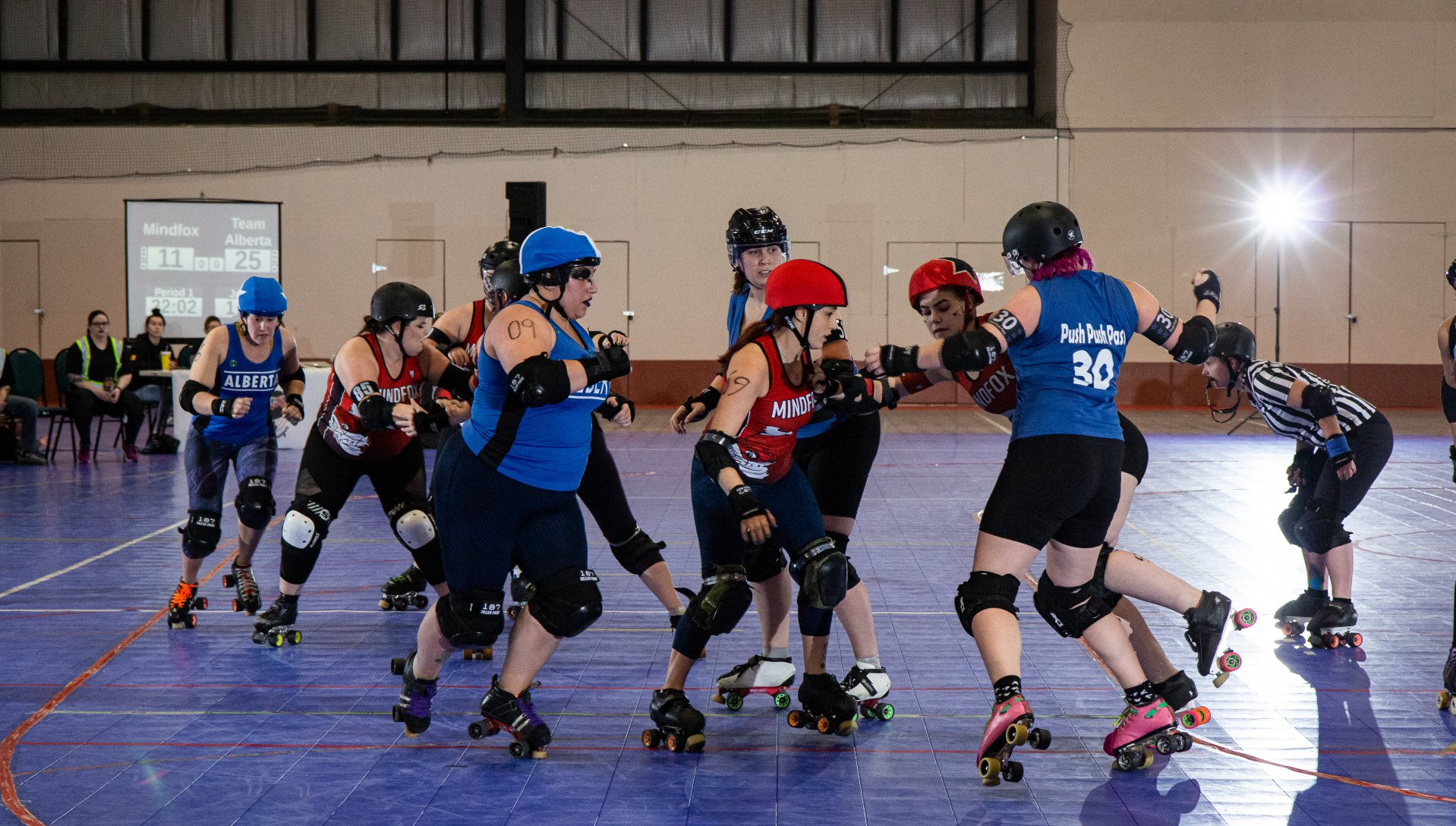 blocker catching a jammer in roller derby