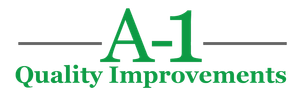 A logo for a company called quality improvements