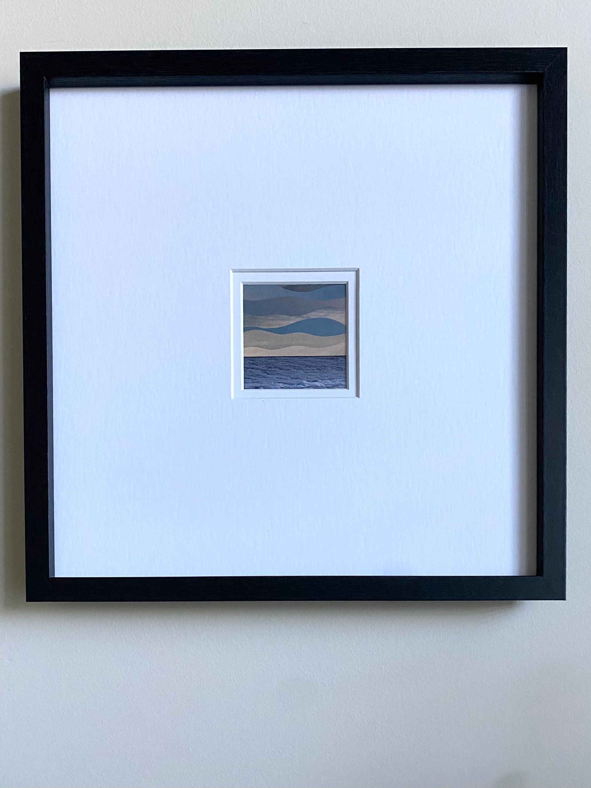 Abstracted ocean scene with layered, wavy sky; blue-grey hues, and icy foreground.