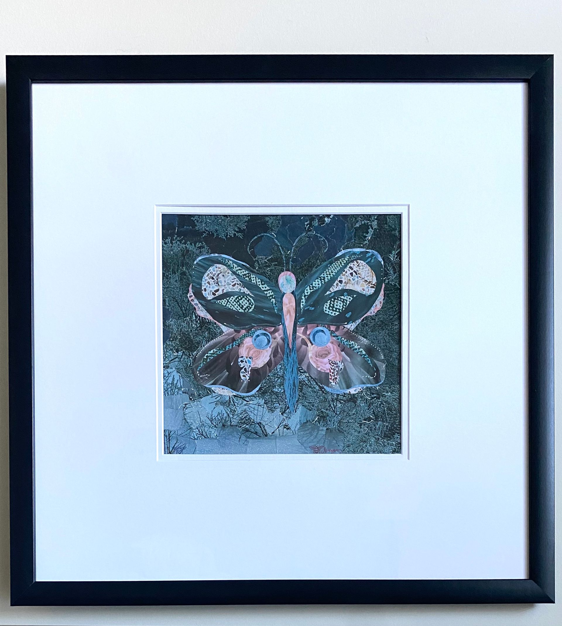 Abstract butterfly illustration in shades of blue, pink, and white.
