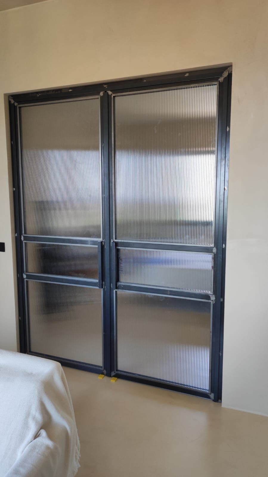 n porte scorrevoli in vetro e ferro