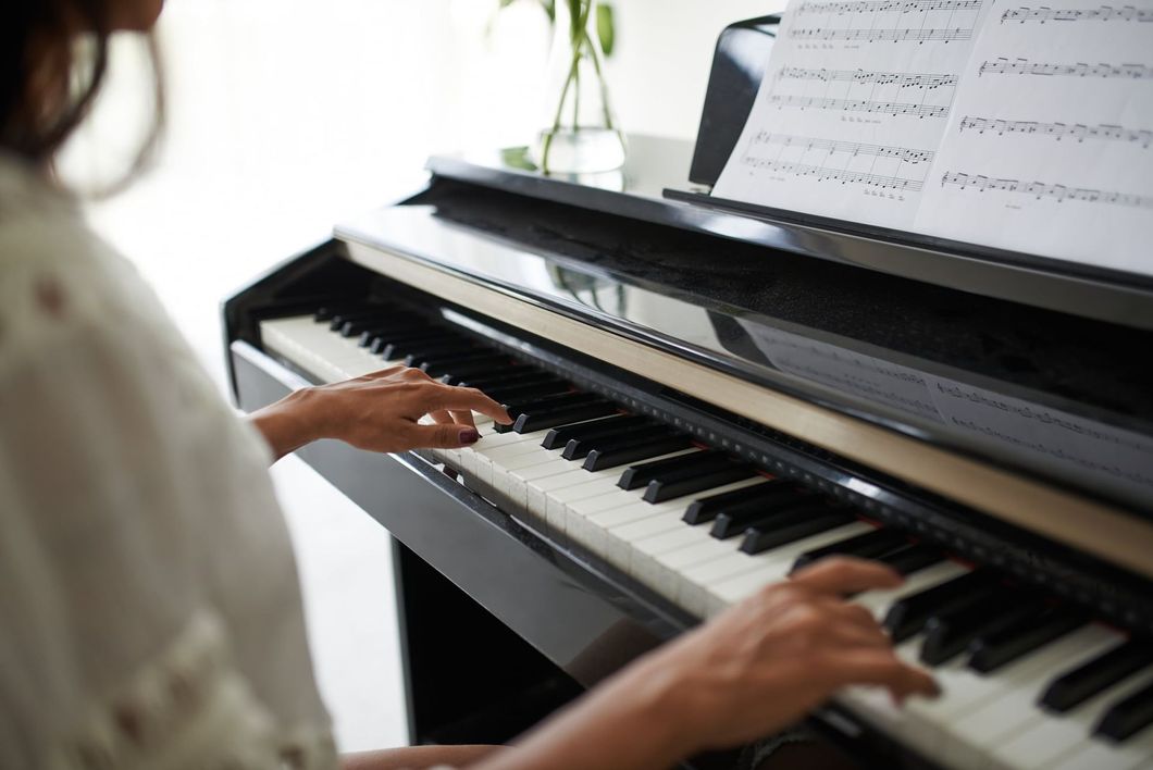 Woman Playing a Piano