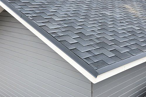 House With Bitumen Shingles Roof