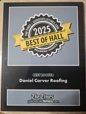 A plaque that says best roofer daniel carver roofing