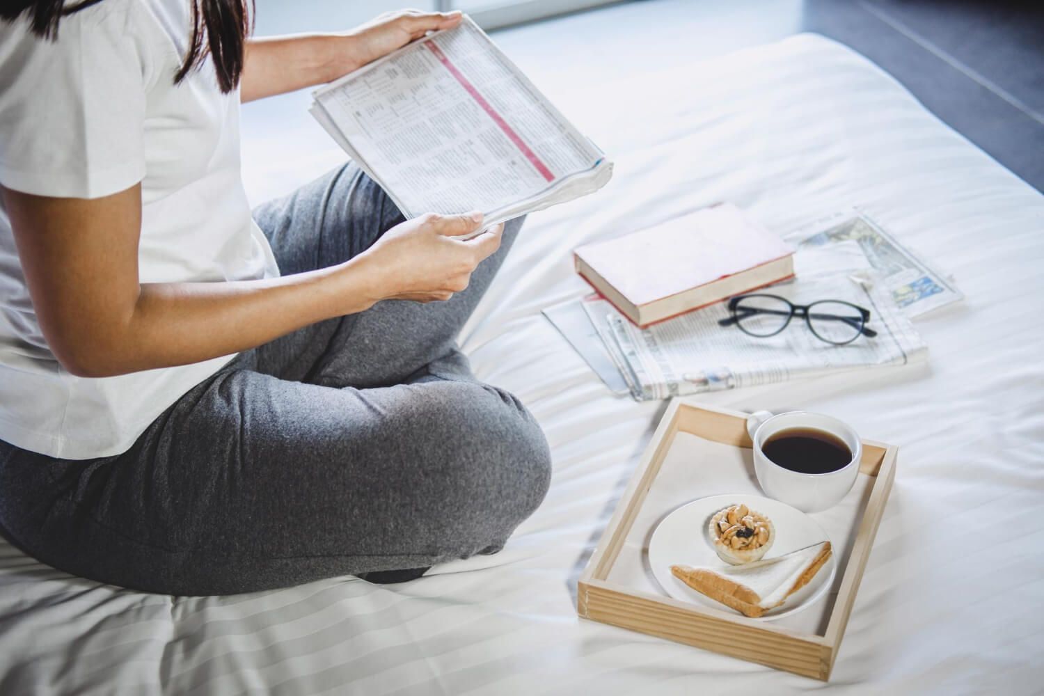 Person demonstrating rhythmic movement exercise as advanced nervous system regulation technique in indoor setting