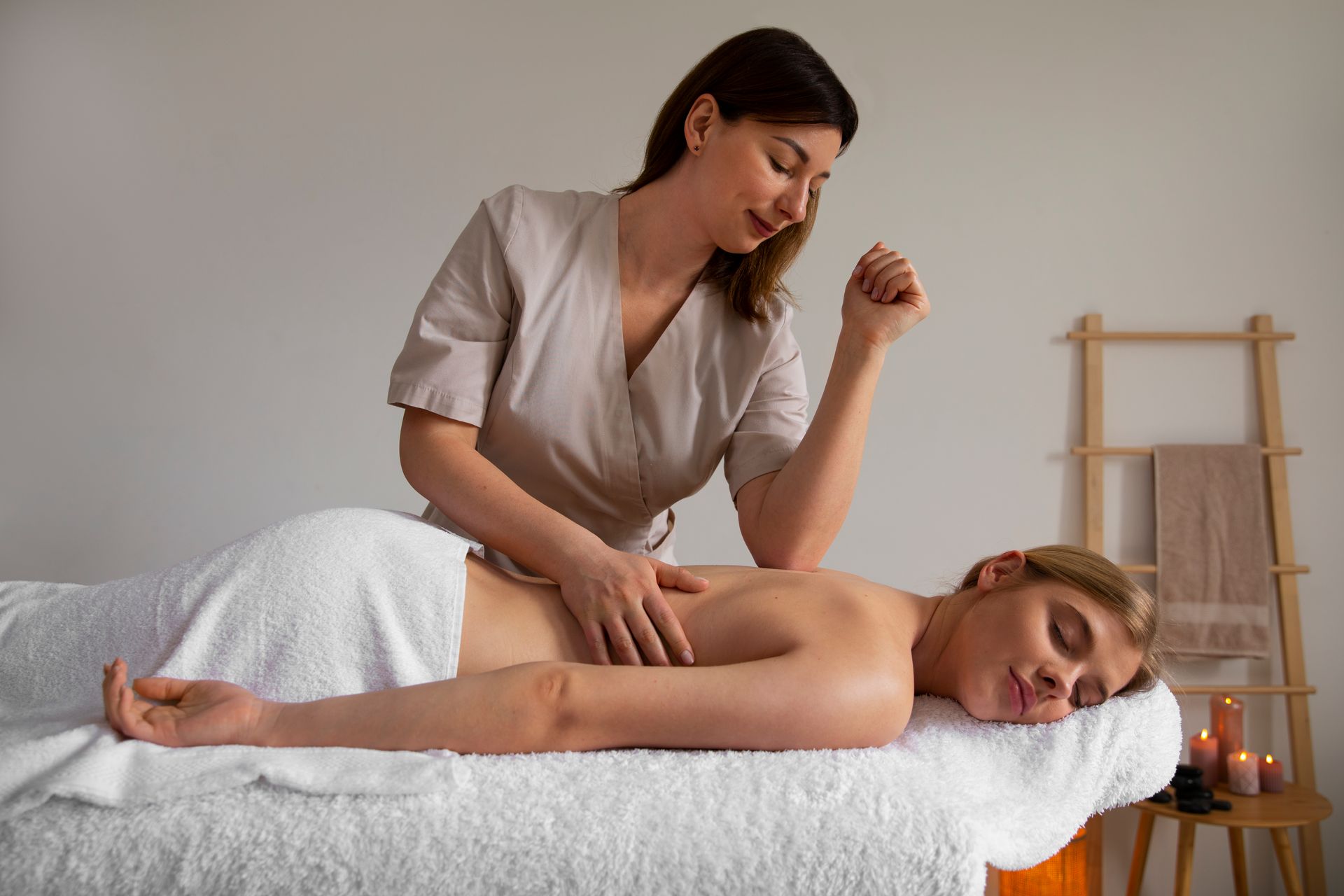 A woman is getting a massage at a spa.